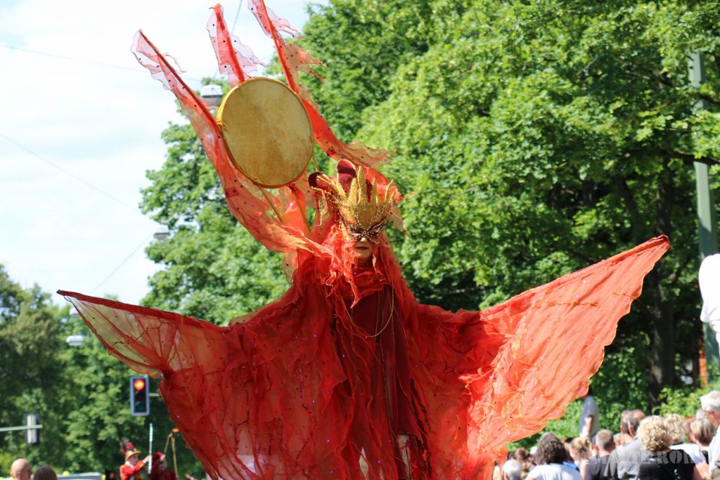 Stilt walker with a beautiful fancy dress during the Carnival der Kulturen 2015 in Bielefeld