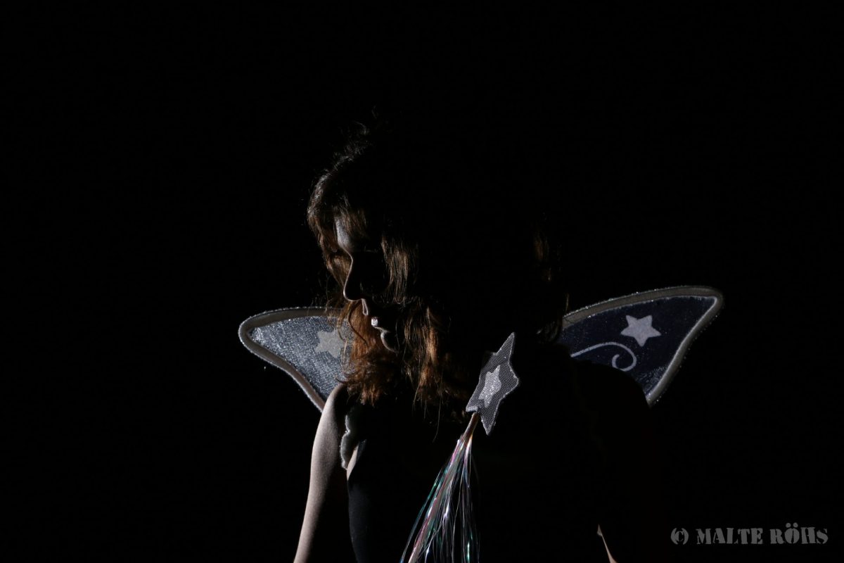 Low-Key picture of a fairy in the dark