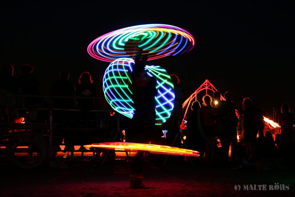 Betty playing an LED hula hoop during the European Juggling Convention (EJC) 2016 in Almere, Netherlands