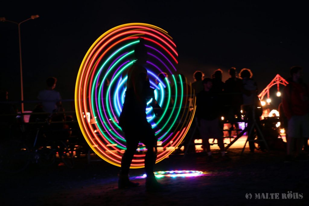 Betty playing an LED hula hoop during the European Juggling Convention (EJC) 2016 in Almere, Netherlands